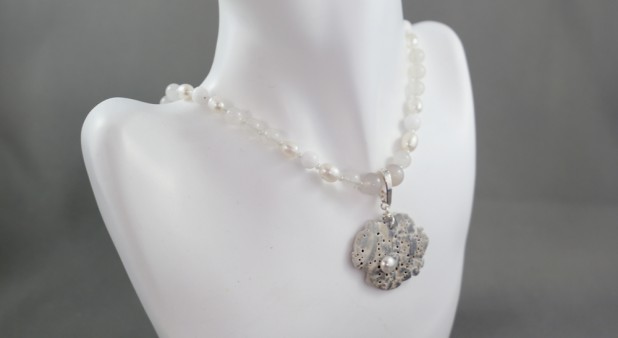 One-of-a-kind necklace made with freshwater pearls, quartz and coral beads